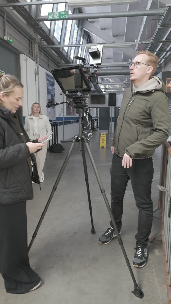 Sam on a Football Law shoot at the stadium