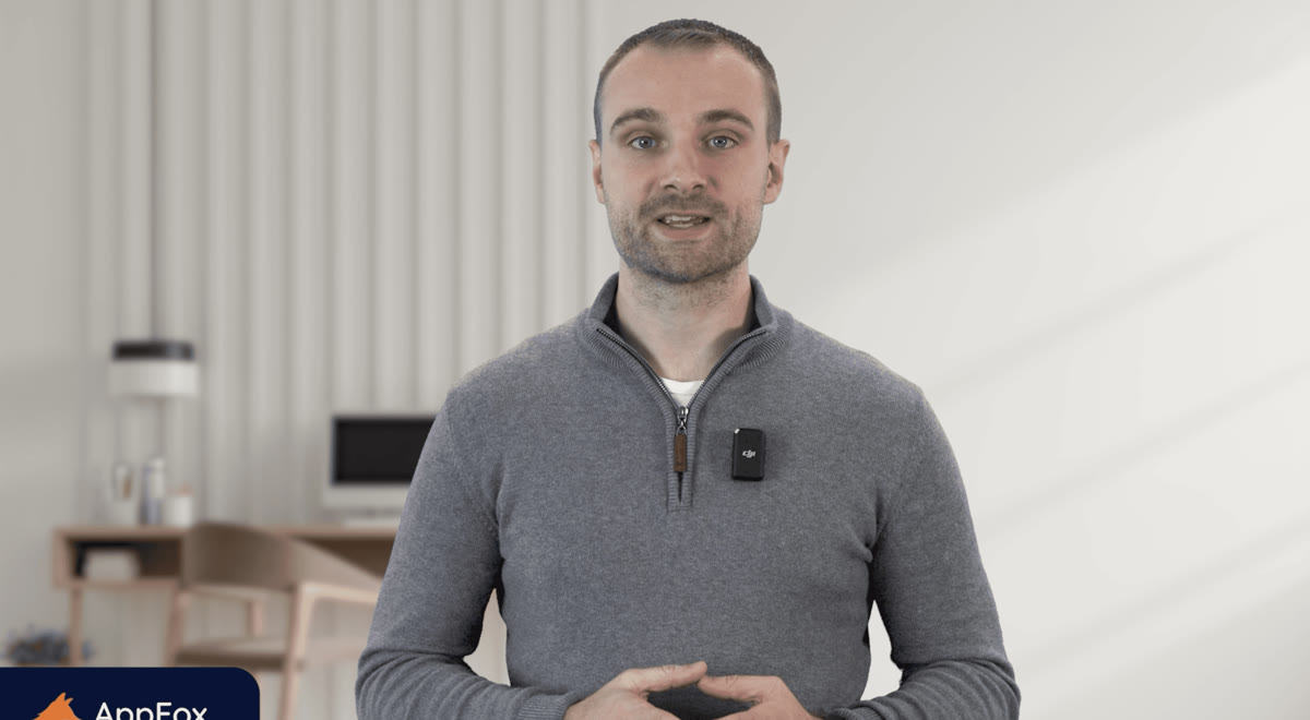 An AppFox presenter delivering a piece to camera with the AppFox branded lower-third, a still from the explainer video
