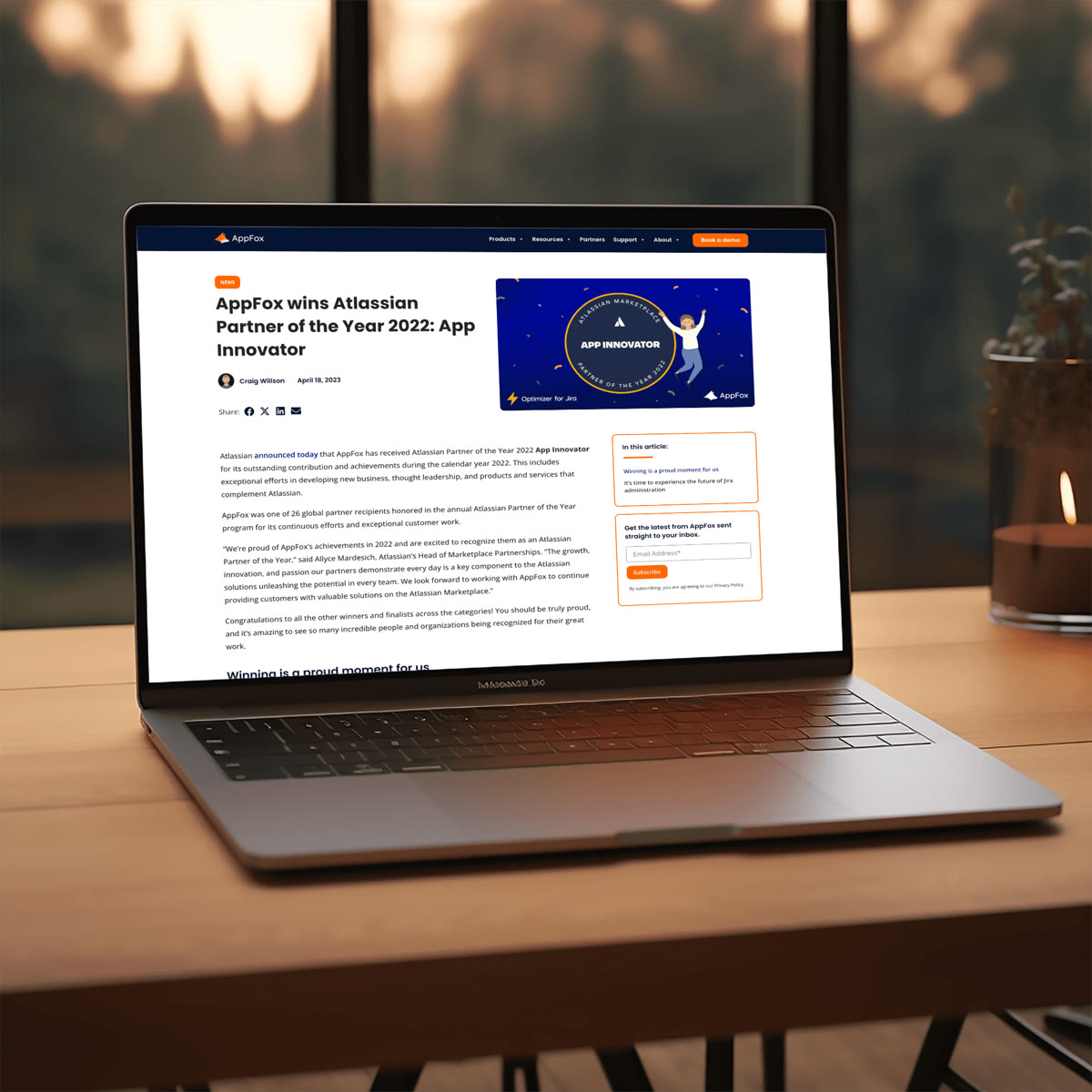 An AppFox web page on a laptop showing their Atlassian Partner of the Year article