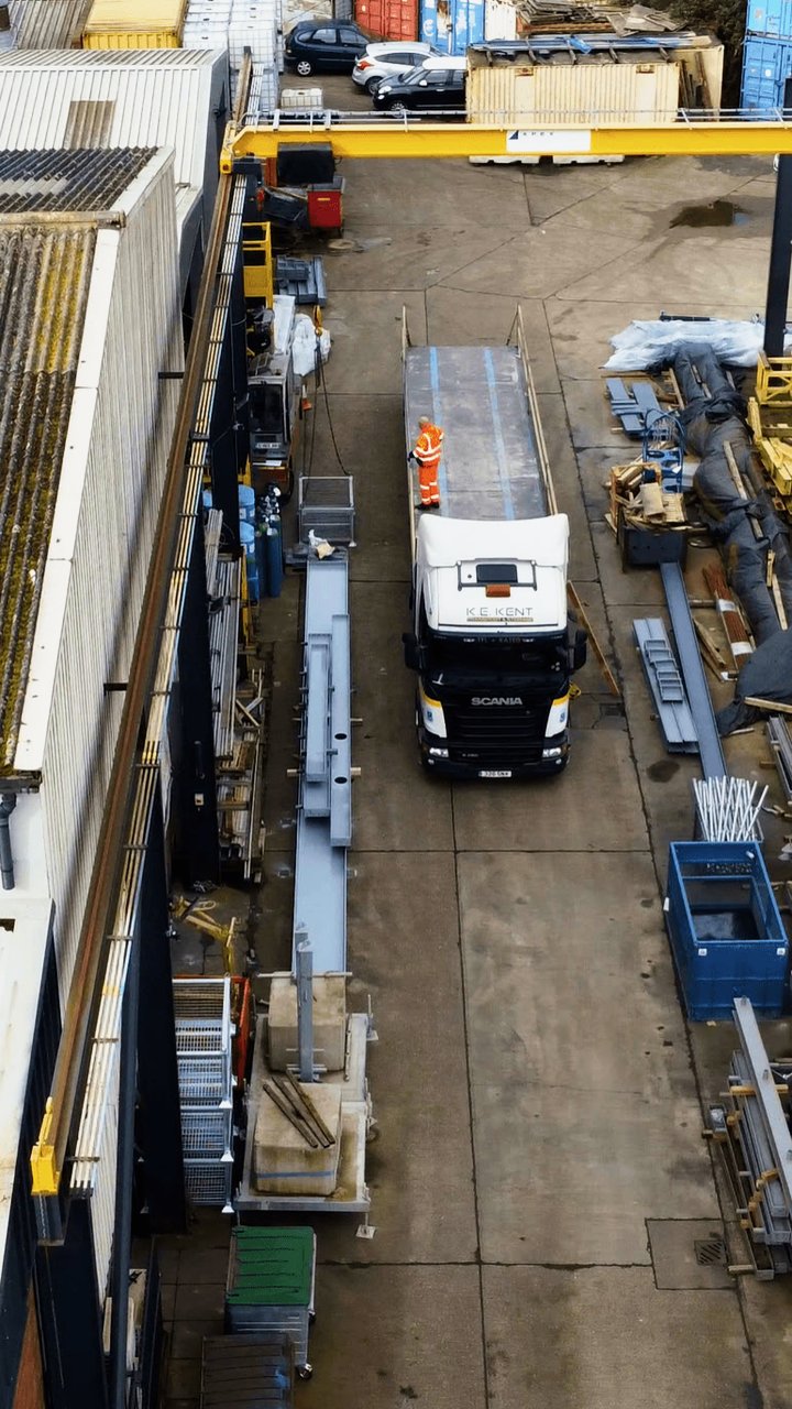Aerial of the Apex yard, the gantry crane loading long steelwork onto a lorry