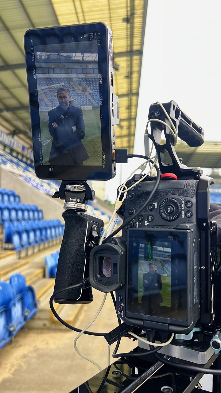 The monitor showing Rob framed up on the pitch