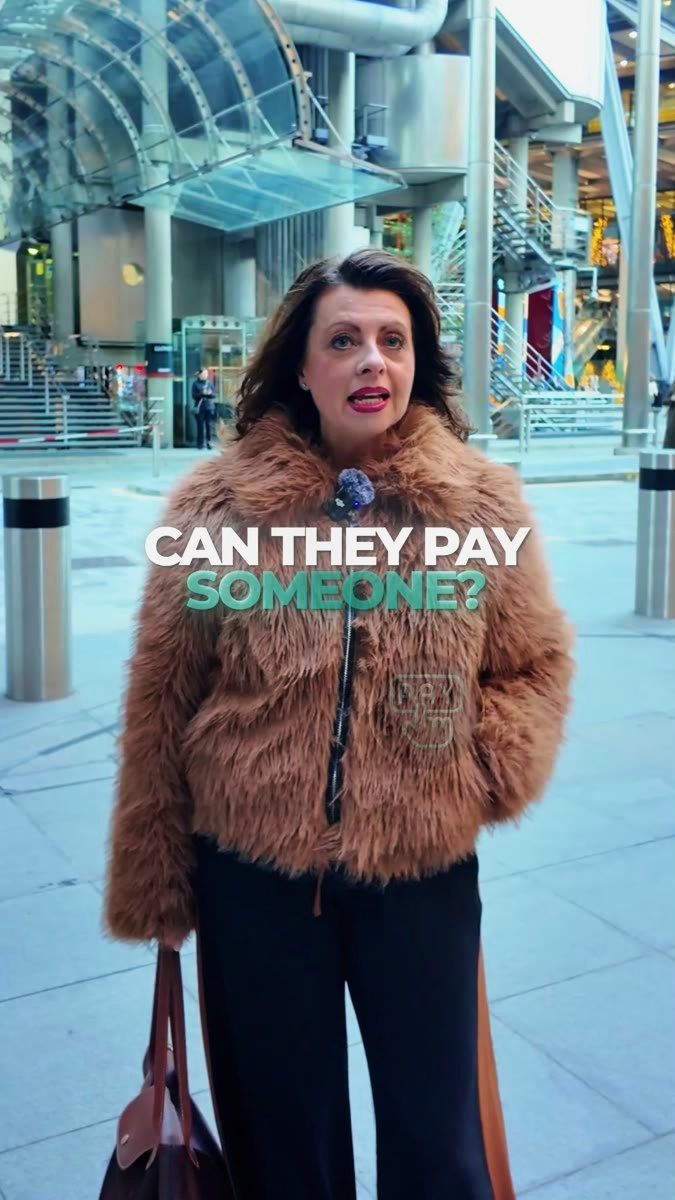 Liz Flavell delivering a captioned video to camera in the City of London