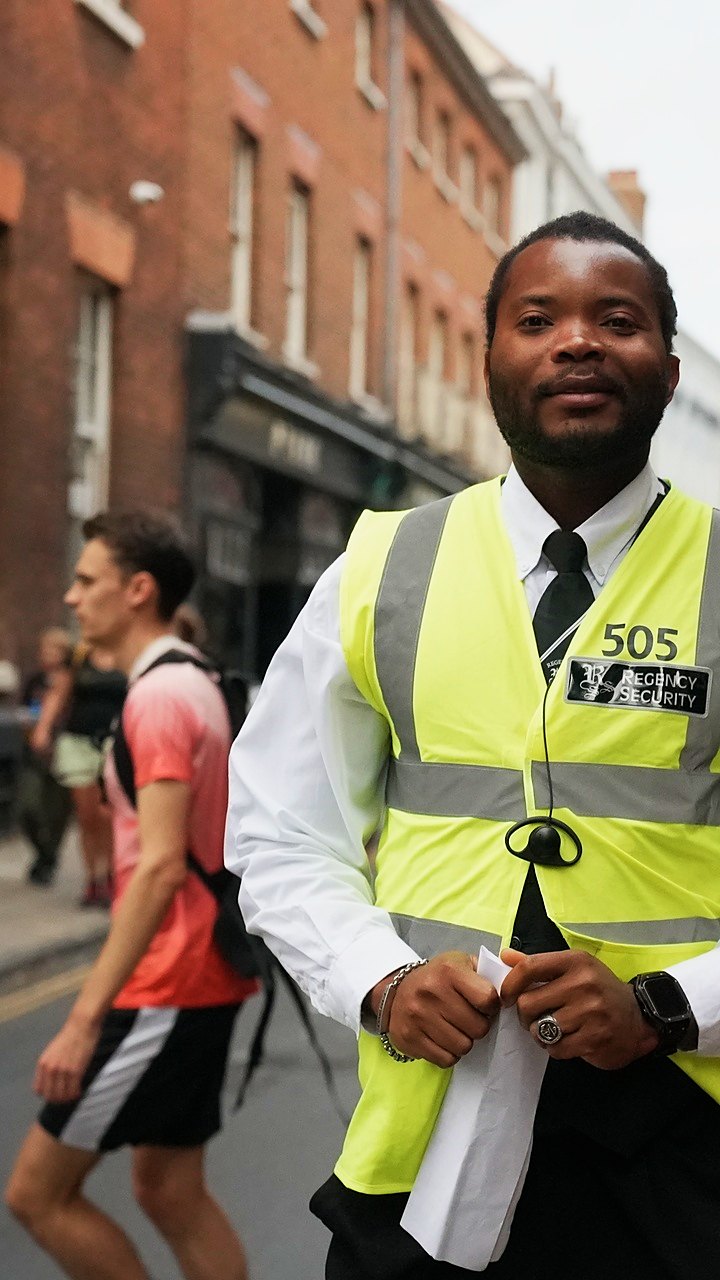 A Regency Security officer smiling on the Run Norwich route