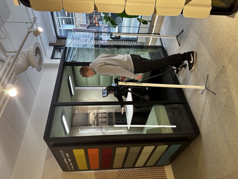 Filming a Fluid acoustic office pod in the showroom
