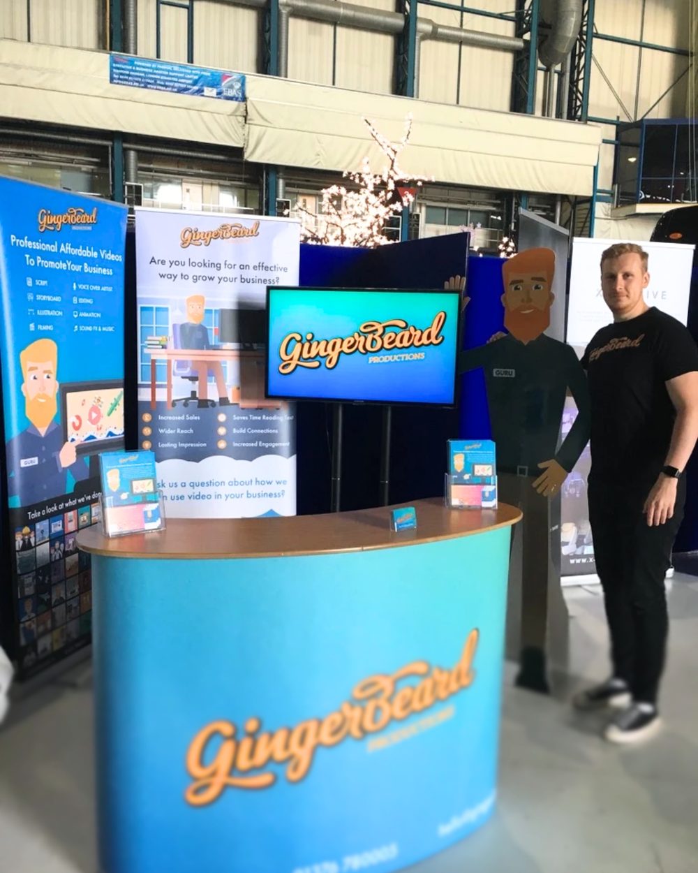 Sam on the Ginger Beard Productions exhibition stand