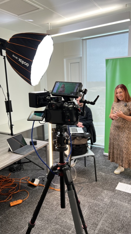 A studio shoot with a presenter on a green screen