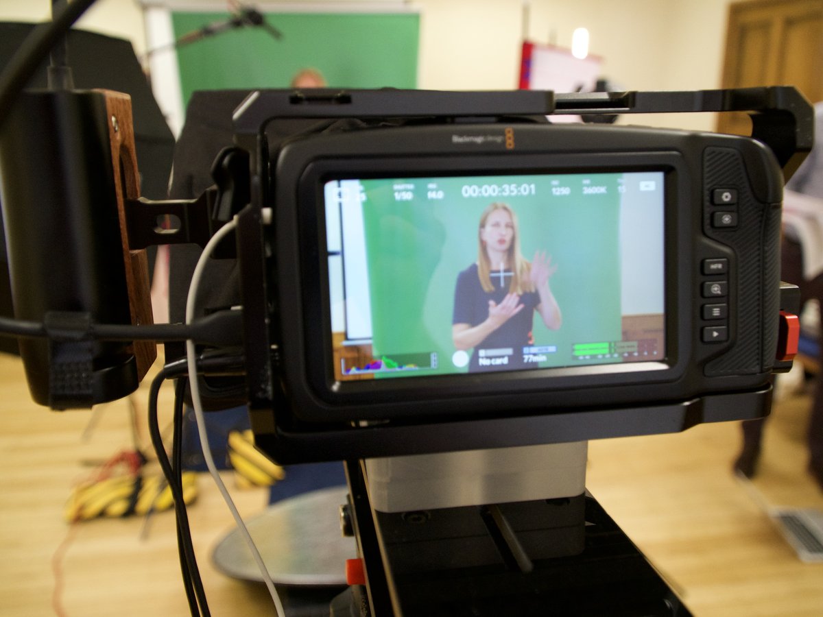 Camera monitor with exposure and focus overlays checking a framed shot, the same close checking we give your site