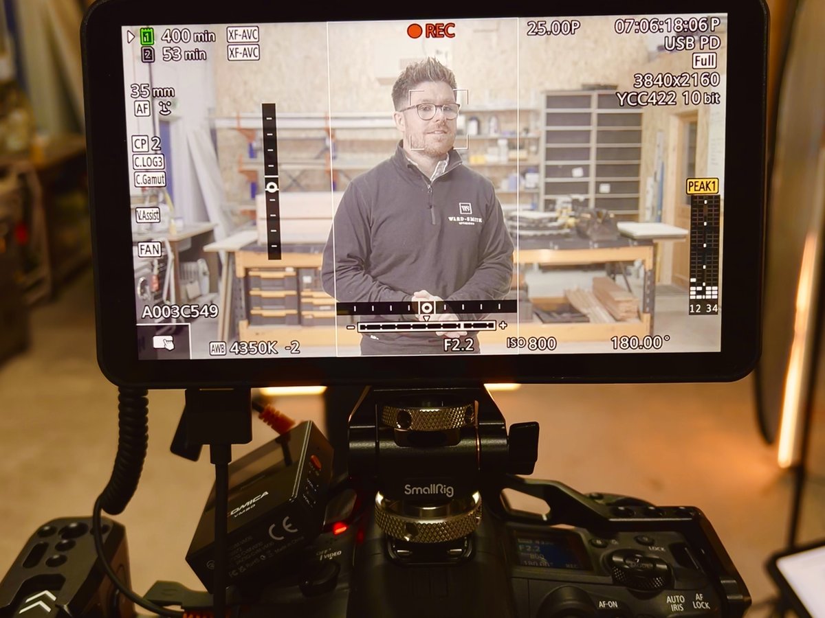 Camera monitor with exposure and focus overlays checking a framed shot, the same close checking we give your site