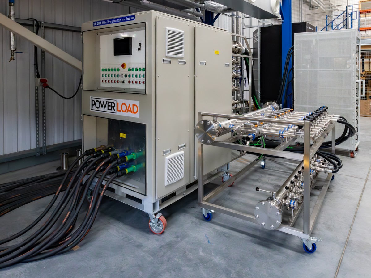 A PowerLoad load bank and stainless steel manifold trolley on the factory floor