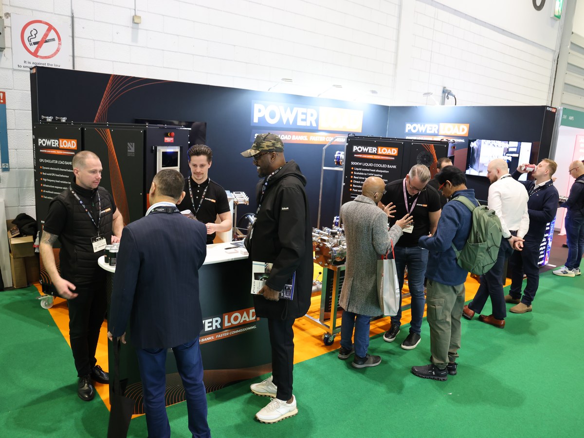 Busy PowerLoad exhibition stand with visitors at Data Centre World