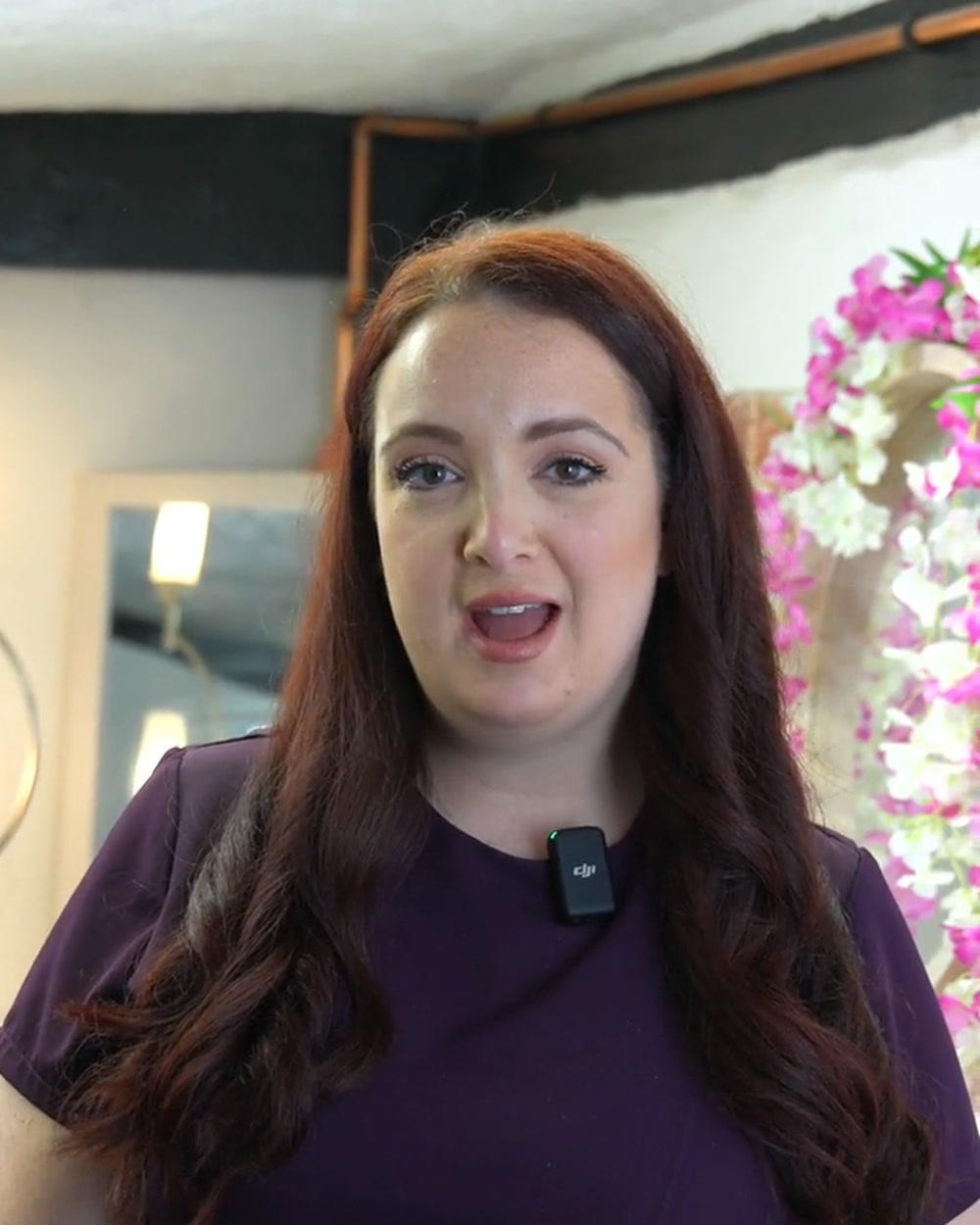 Gemma, the GeGe salon bridal specialist, introducing herself to camera in the salon